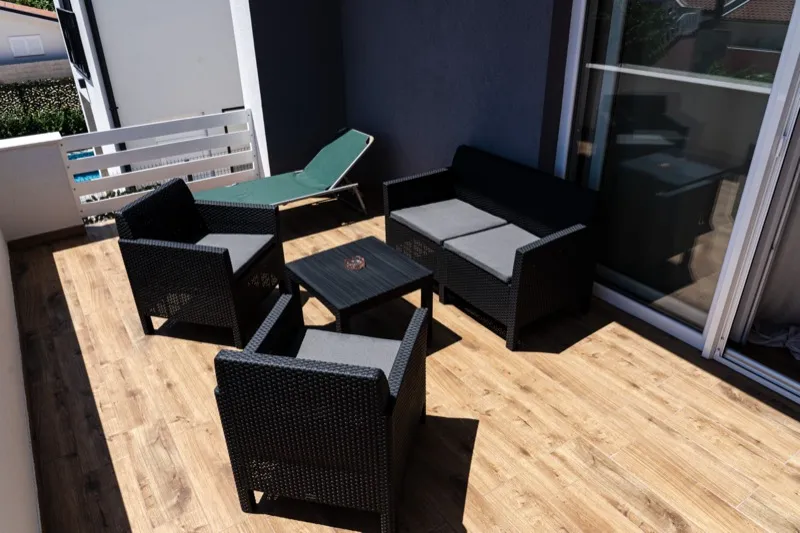 Covered terrace with lounge furniture